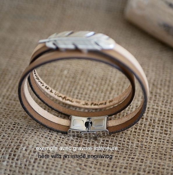 Dubbel l&auml;derrem i duo dekorerad med en silverfj&auml;der