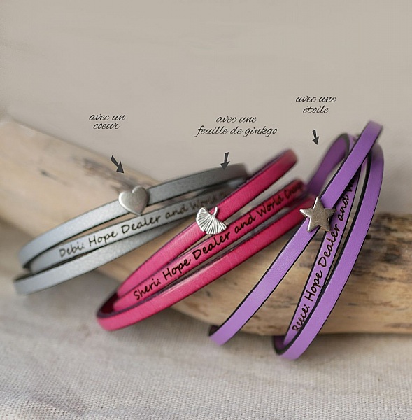 Anpassningsbar l&auml;derrem med flera vred med motiv av stj&auml;rnor, o&auml;ndlighet eller hj&auml;rtan 