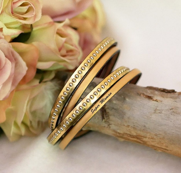 Dubbel graverad guld l&auml;derrem med silverp&auml;rlor, anpassningsbar