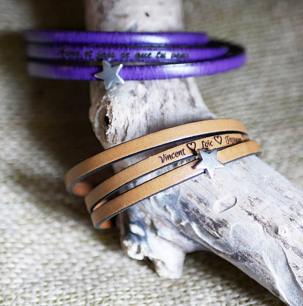 Anpassningsbar l&auml;derrem med flera vred med motiv av stj&auml;rnor, o&auml;ndlighet eller hj&auml;rtan 