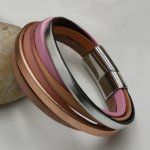 Manschettarmband i flera läder, koppar-persikofärg