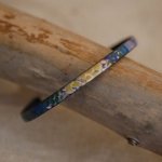 Kvinnoarmband i fint läder med impressionistiskt tryck
