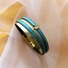 Bracelet manchette femme aux 4 cuirs turquoises et dorés au fermoir à extension